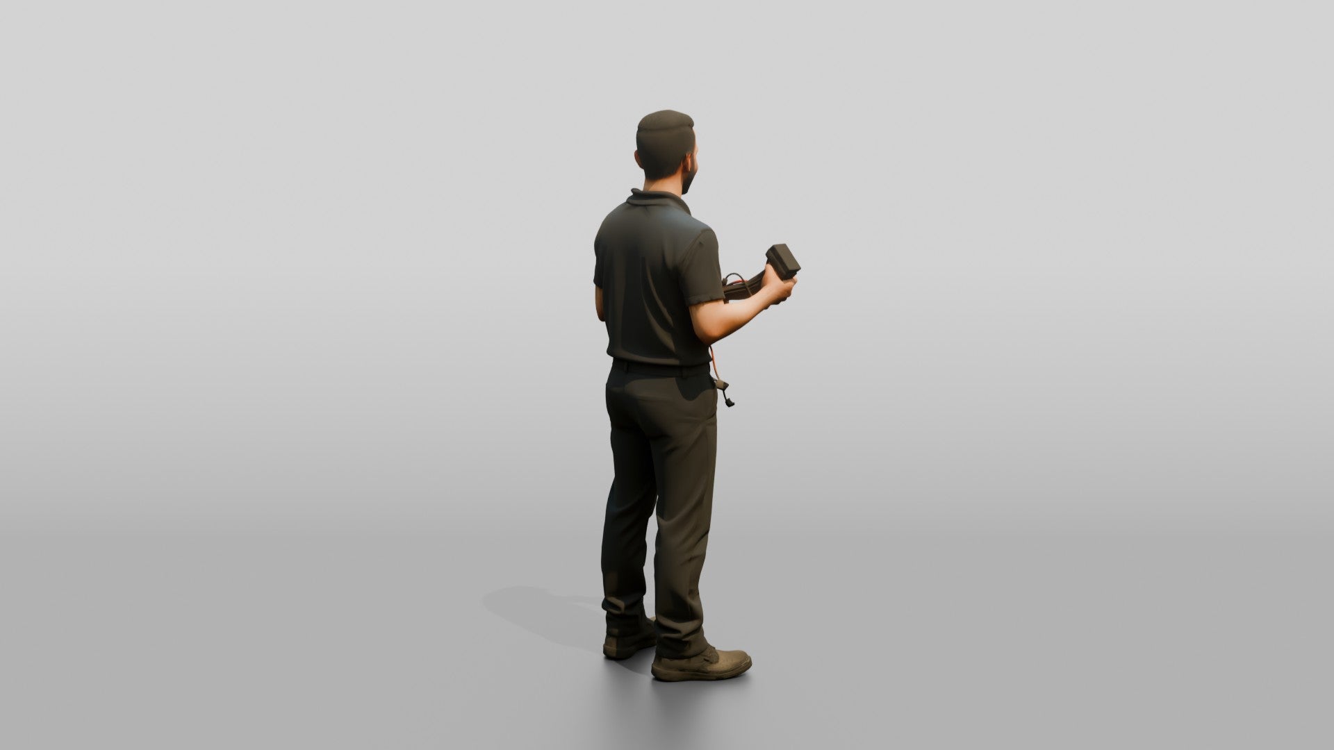 Mechanic Holding a Wire Harness Connector