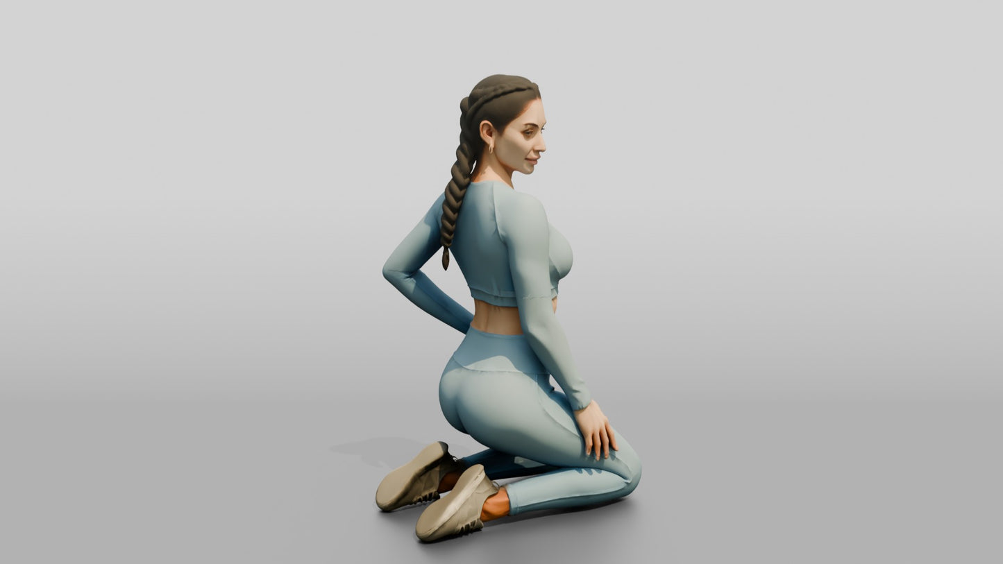 Woman Kneeling in Dusty Blue Long-Sleeve Activewear