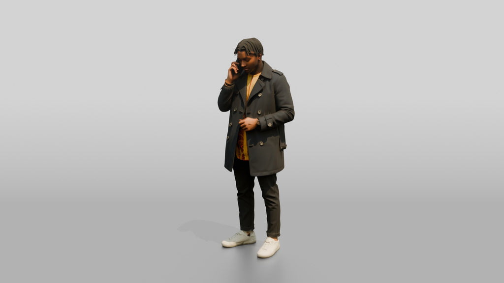 Stylish African Man in a Trench Coat on His Phone