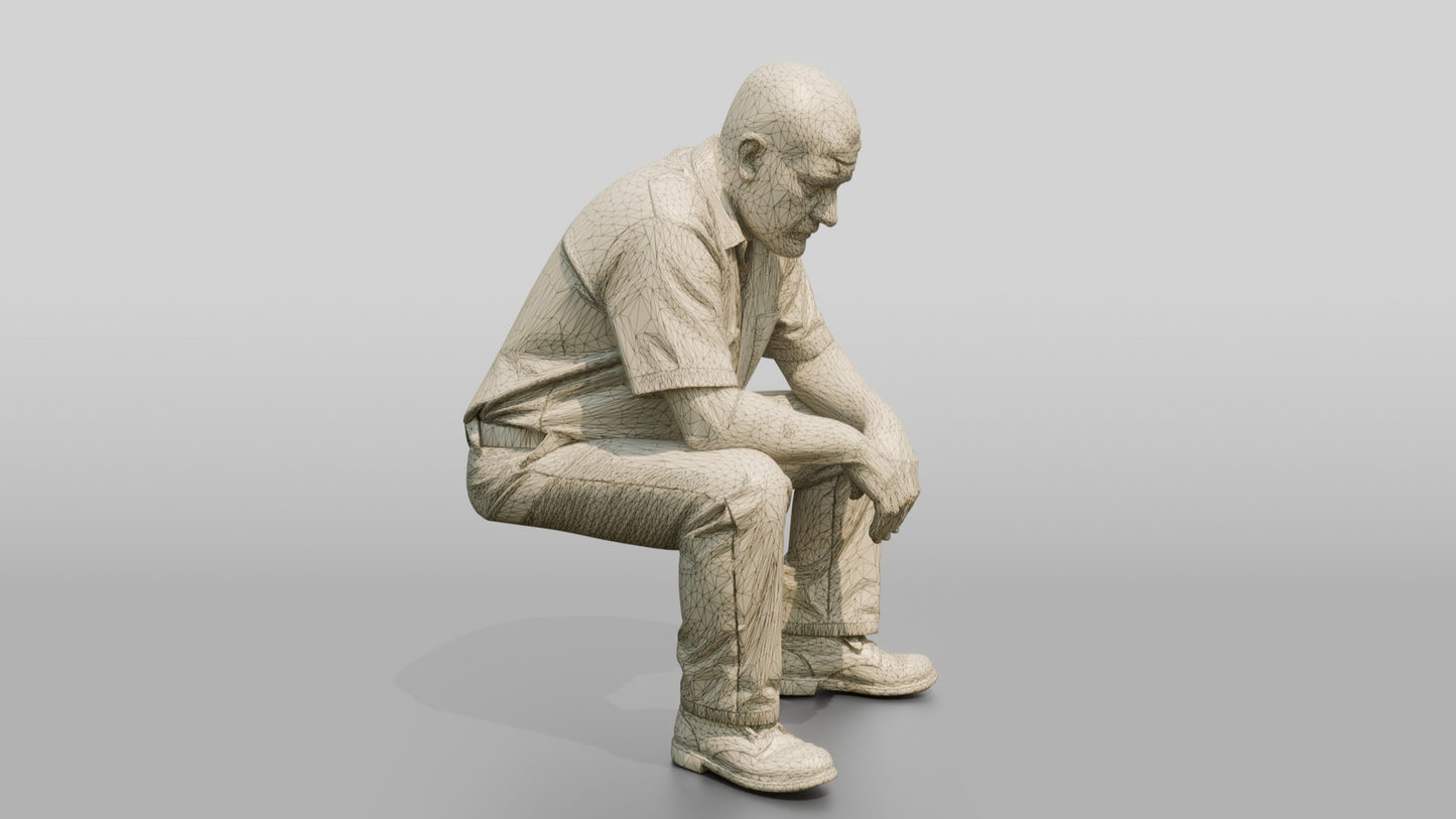 White Male Prisoner Sitting on the Edge of an Invisible Cot