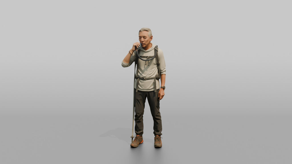Hiker Drinking from a Hydration Bladder