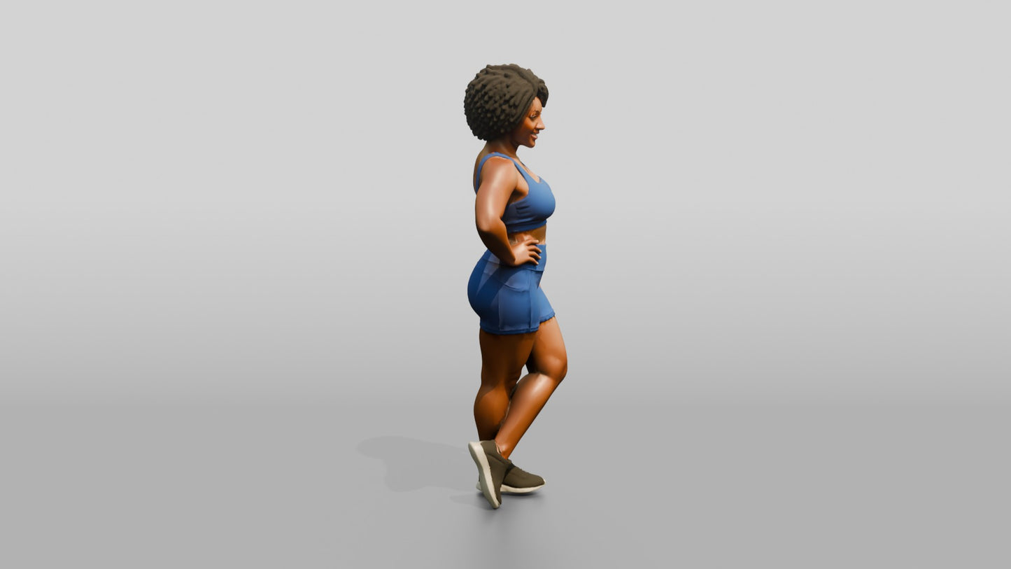 Black Woman in Blue Activewear with Hand on Hip