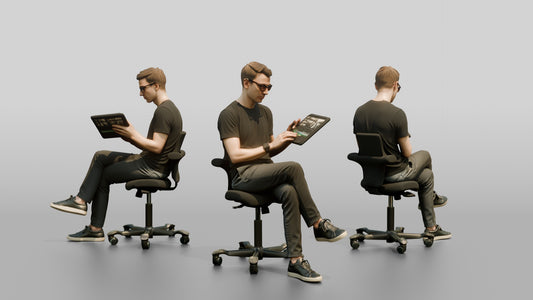 Man Seated with a Tablet and Glasses