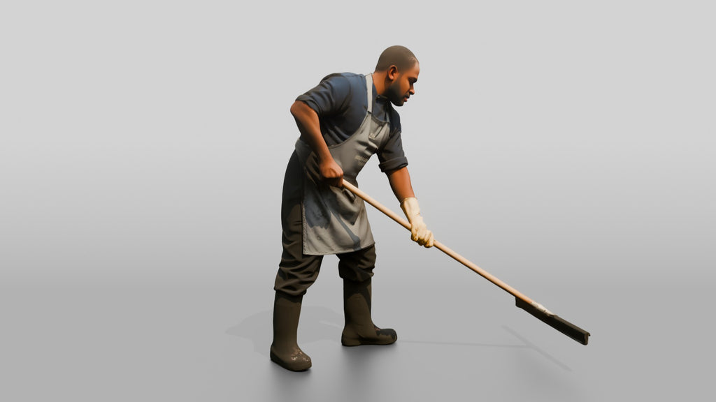 Kitchen Porter Squeegeeing the Floor