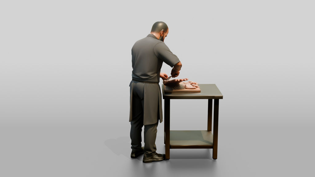 Chef Trimming Rack of Lamb
