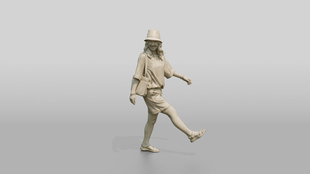 Woman Kicking Up Wet Sand Walking