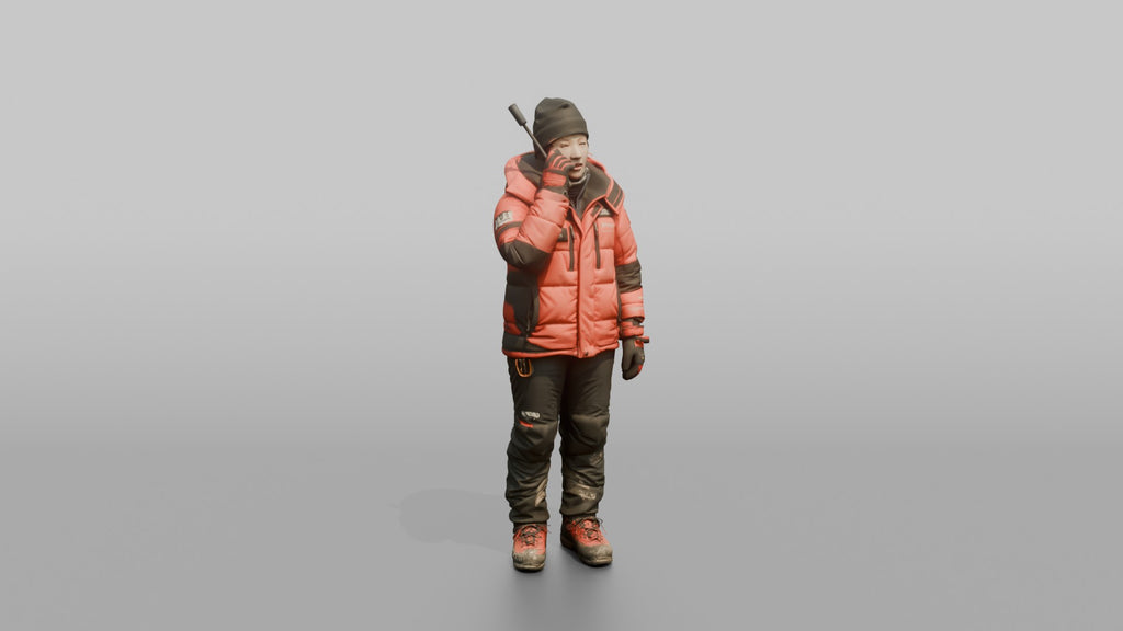 Expedition Member Holding a Satellite Phone