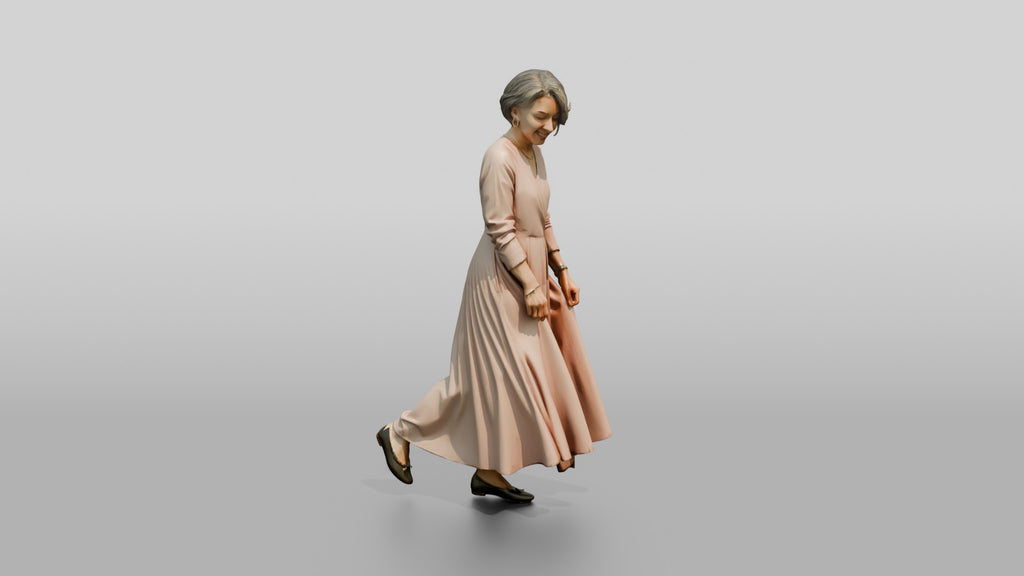 Elegant Woman in Flowing Pink Dress