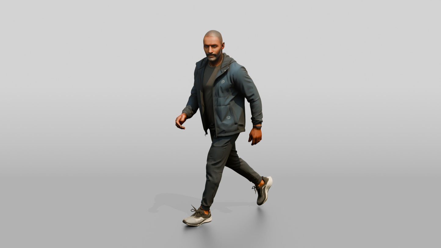 Black Man in Navy Windbreaker Walking Quickly