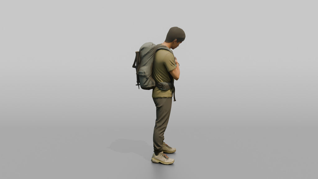 Hiker Adjusting His Backpack Strap