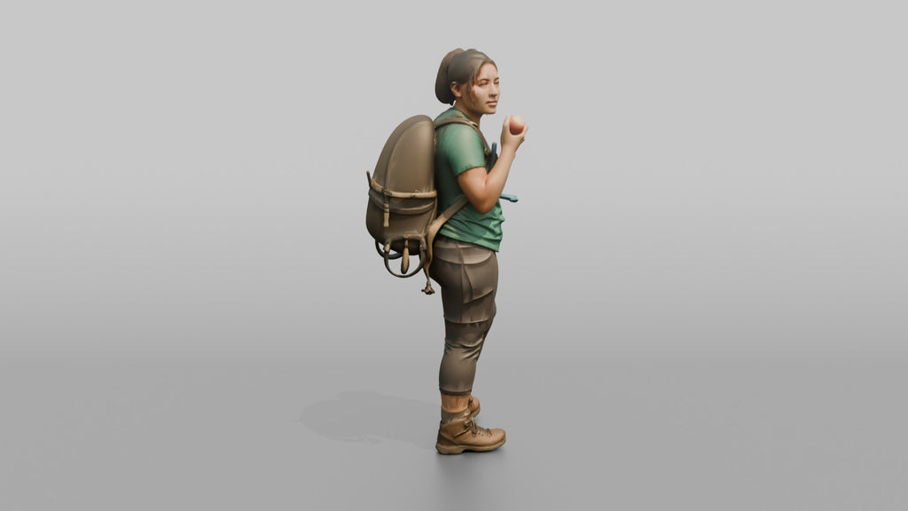 Hiker Eating an Apple on the Trail