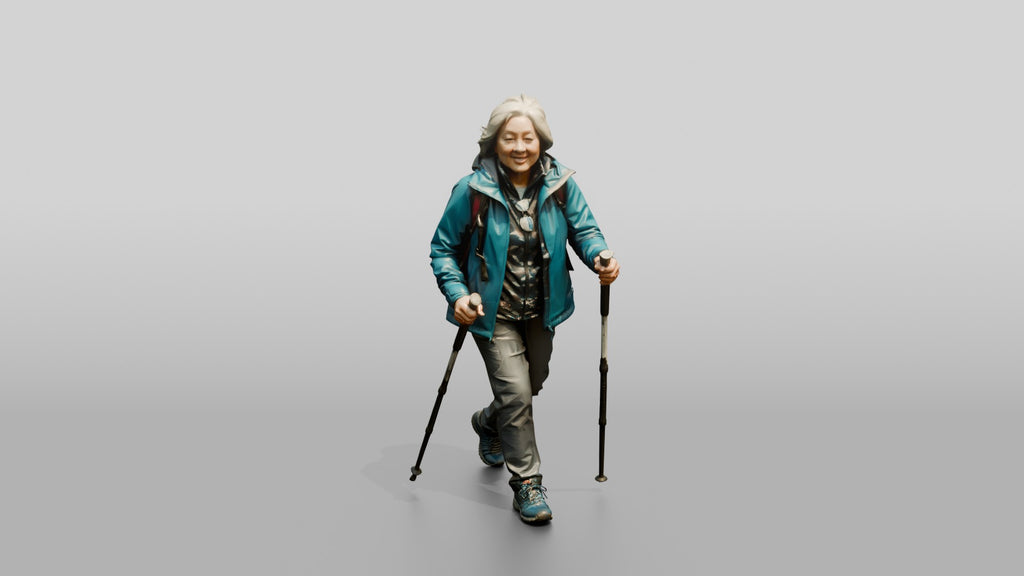 Elderly Chinese Woman Hiking with Trekking Poles