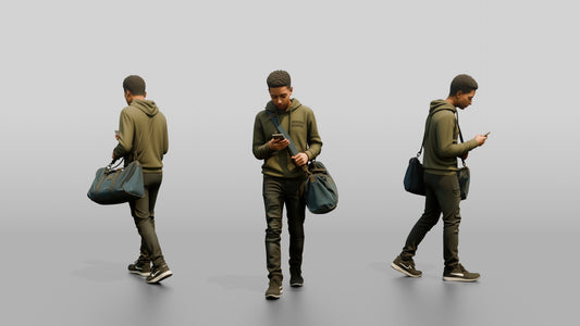 Young Black Man Walking and Looking at Phone with Duffel Bag