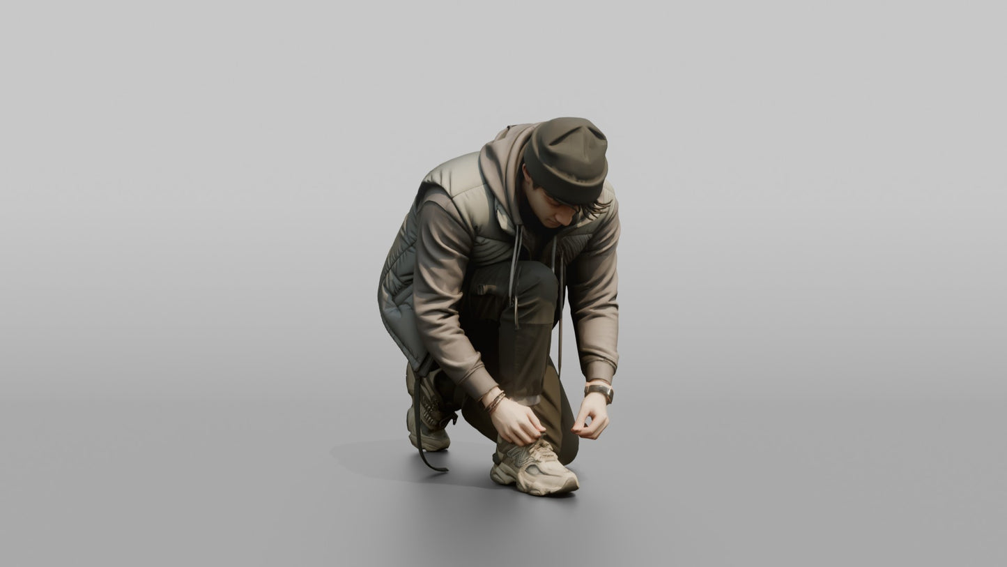 Man Crouching to Tie His Sneaker Laces