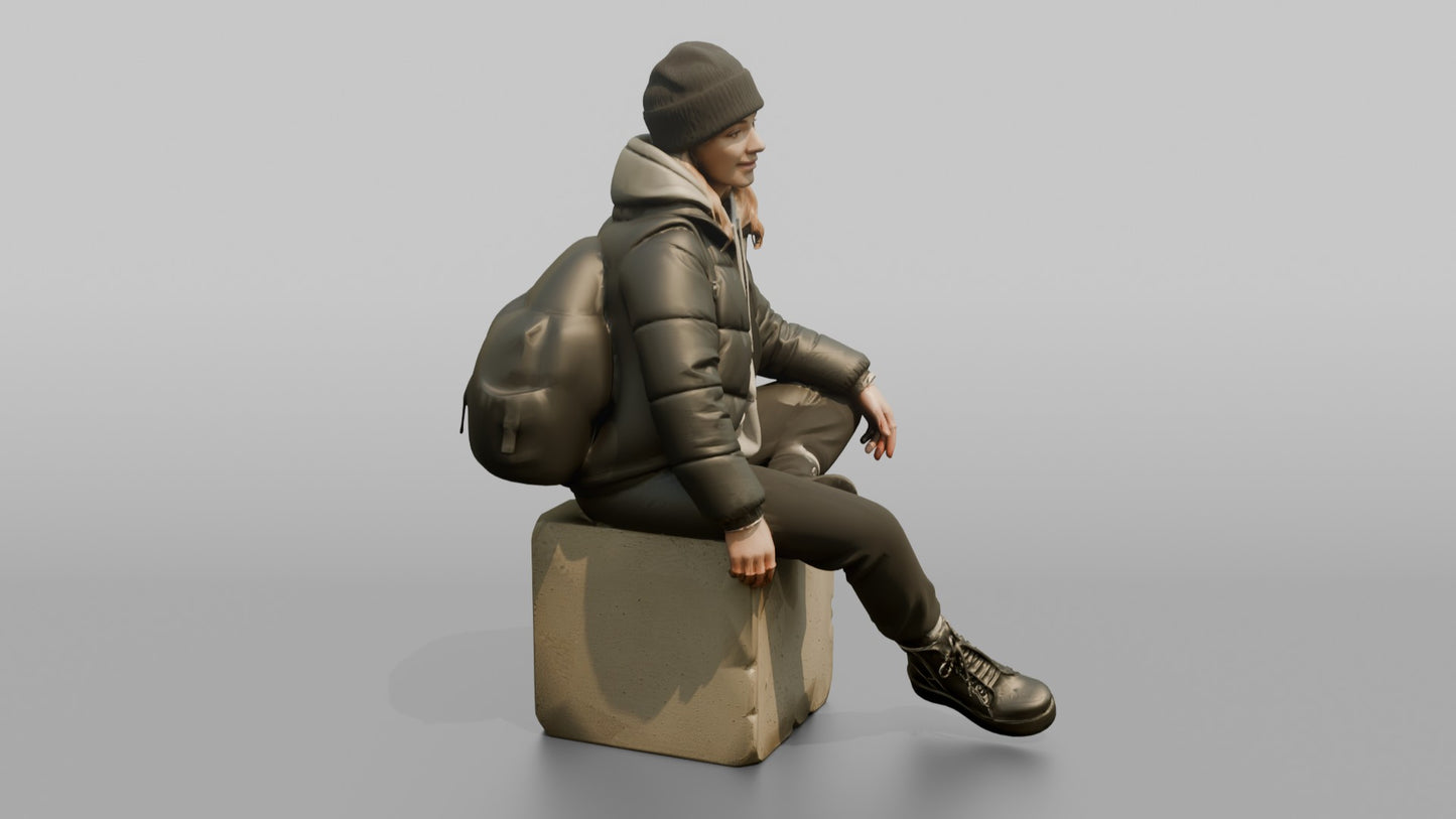Woman Sitting in a Cropped Puffer Jacket