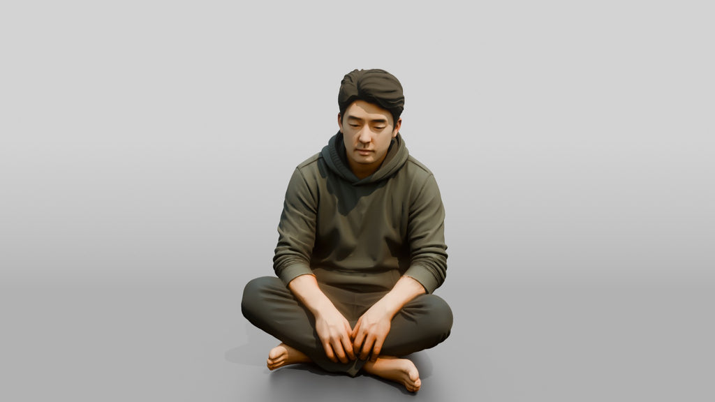 Homeless Man Looking Unfocused While Seated on the Floor