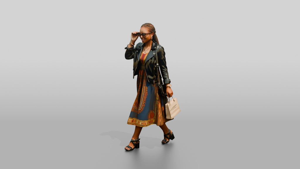 Stylish African Woman in a Leather Jacket and Print Dress
