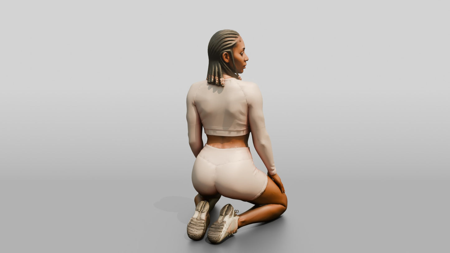 Woman with Braids Kneeling in Blush Activewear
