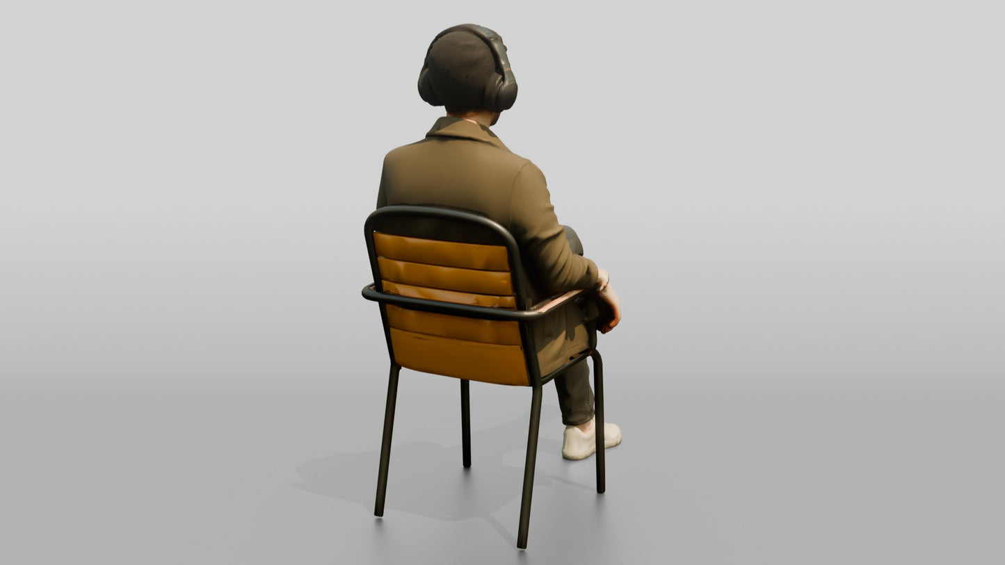 Man Listening to Music with Tea