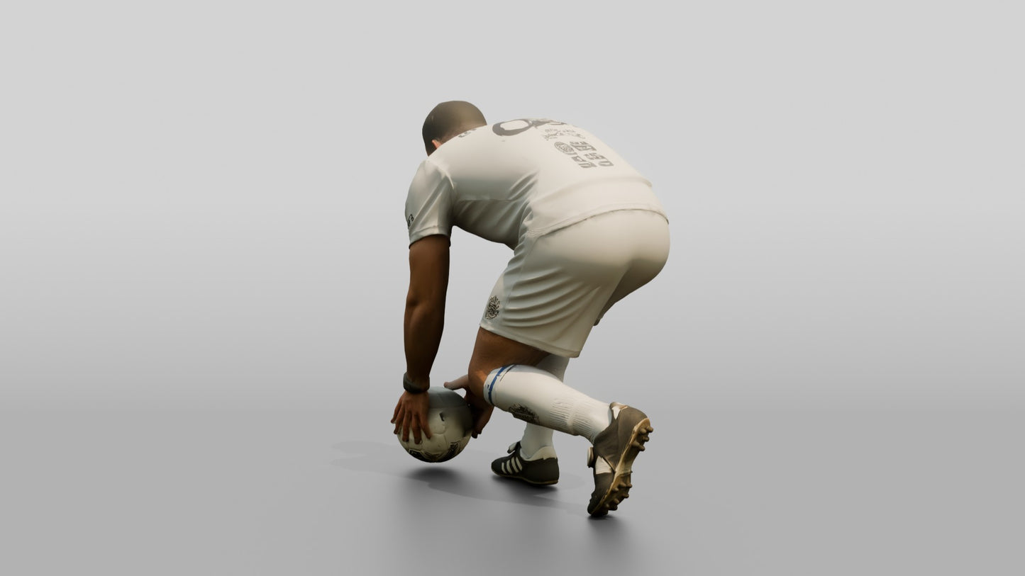 Soccer Player Placing the Ball for Penalty