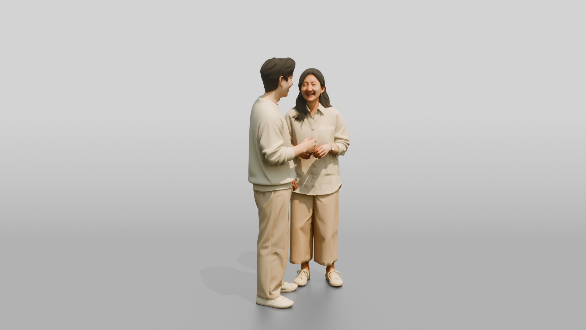 Laughing Couple in Coordinated Cream Outfits