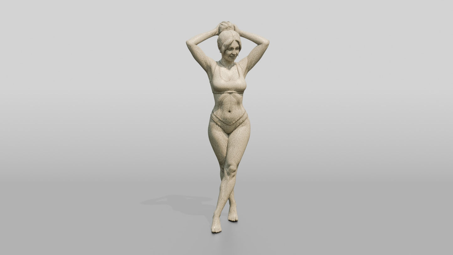 Woman in Black Two-Piece Swimsuit with Arms Raised