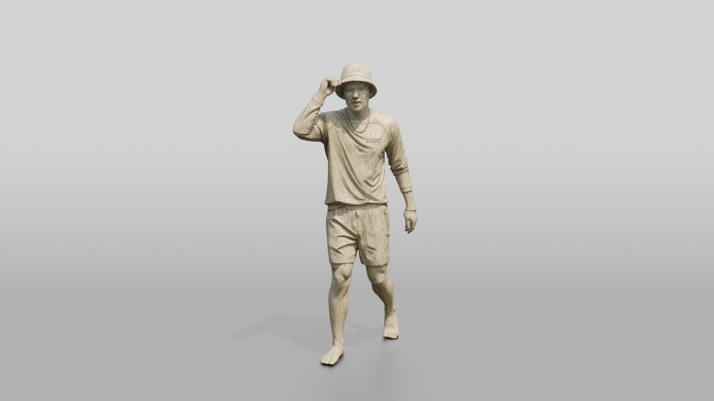 Man Adjusting Bucket Hat Brim