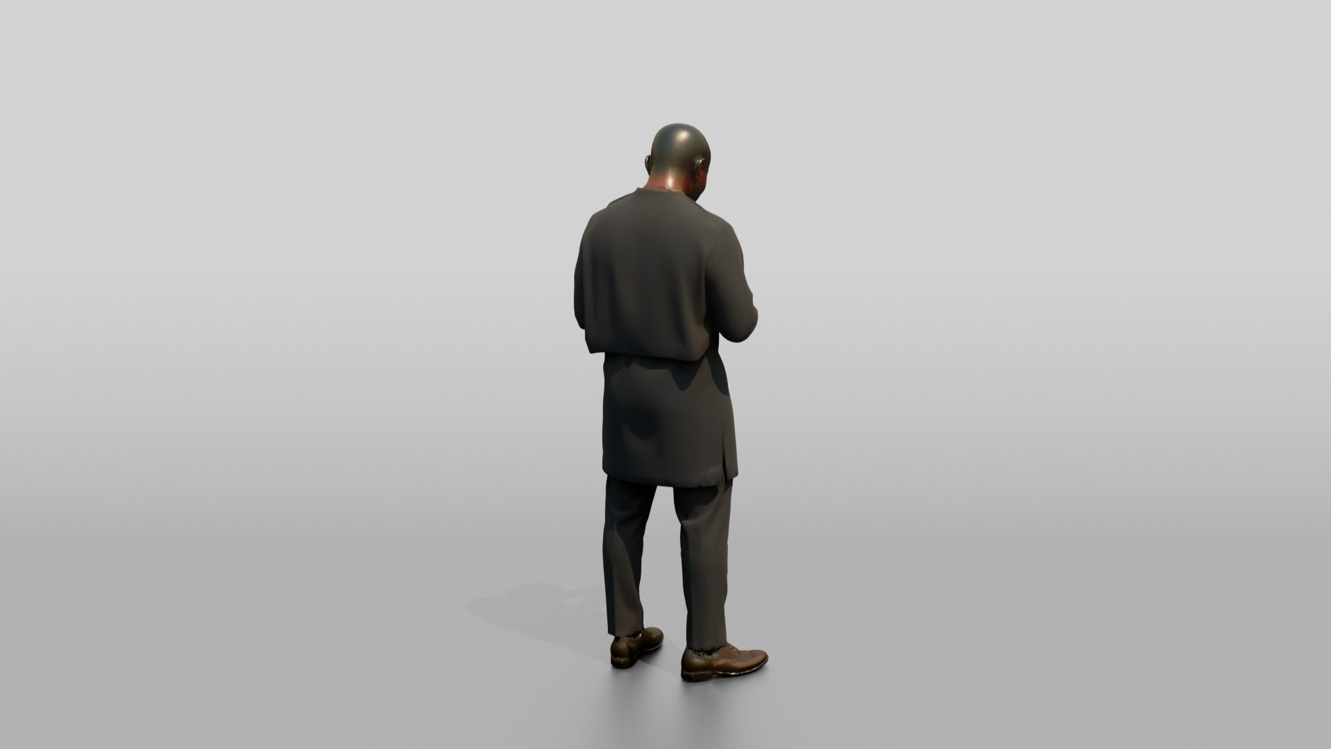 African Man in a Senator-Style Suit Checking His Phone