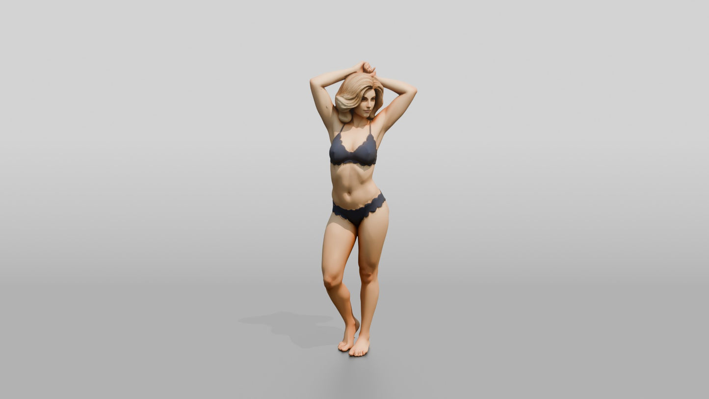 Blonde Woman in Navy Two-Piece Swimsuit Arms Raised