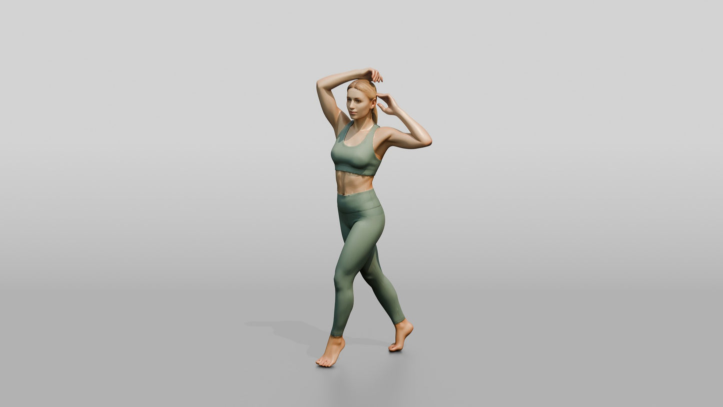 Blonde Woman Tying Her Ponytail in Sage Activewear