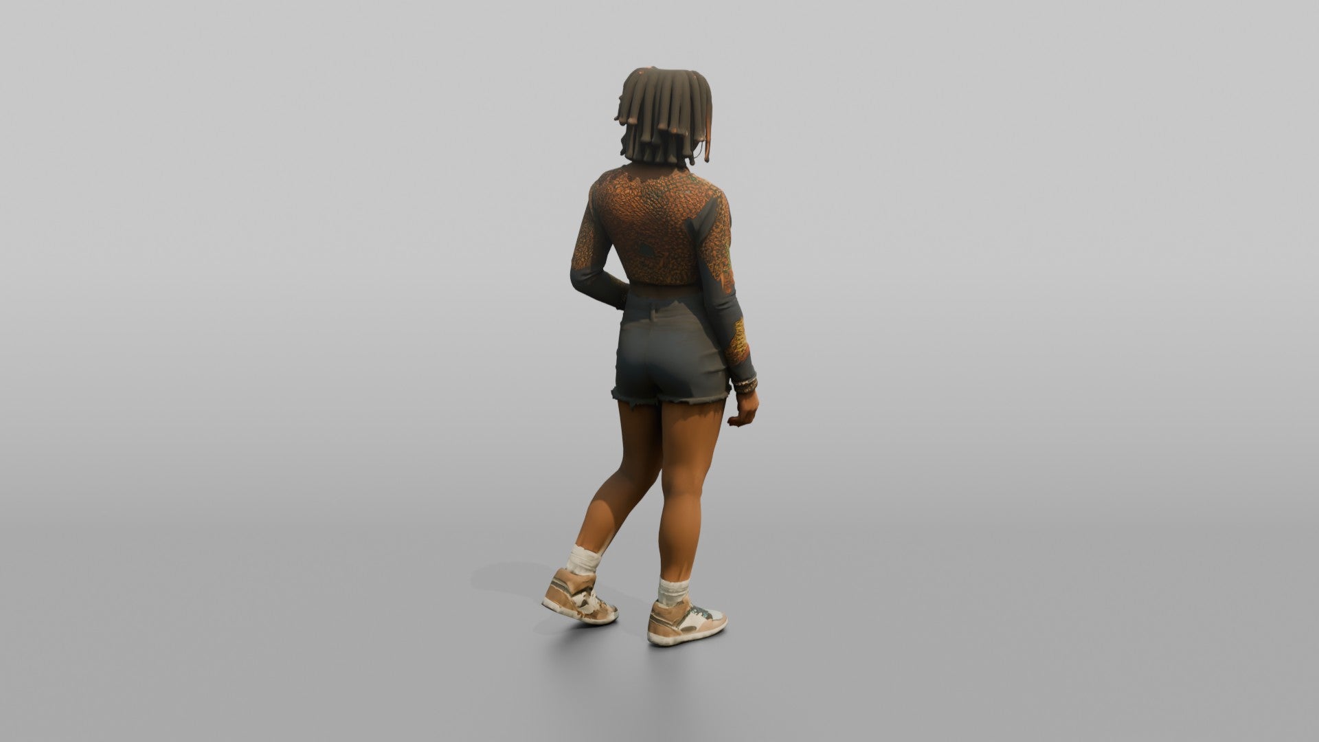 African Woman in Colorful Crop Top and Denim Shorts