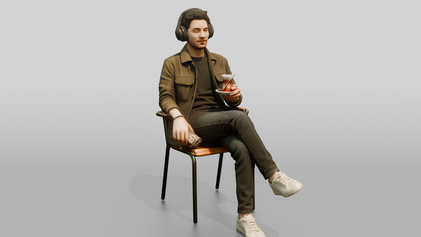 Man Listening to Music with Tea