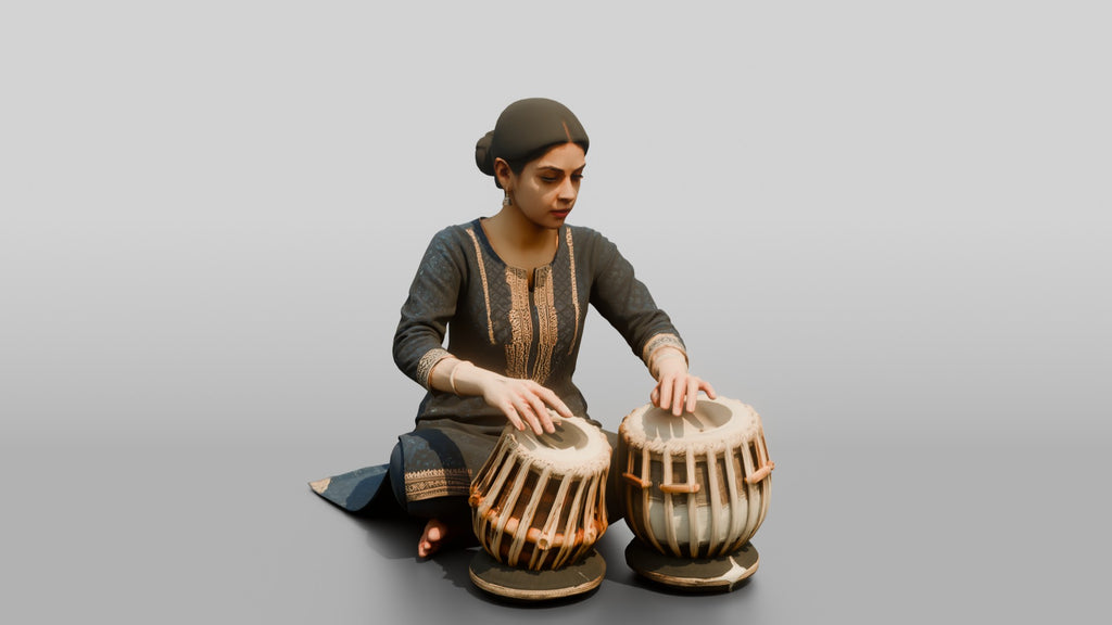 Tabla Player Seated with Twin Drums