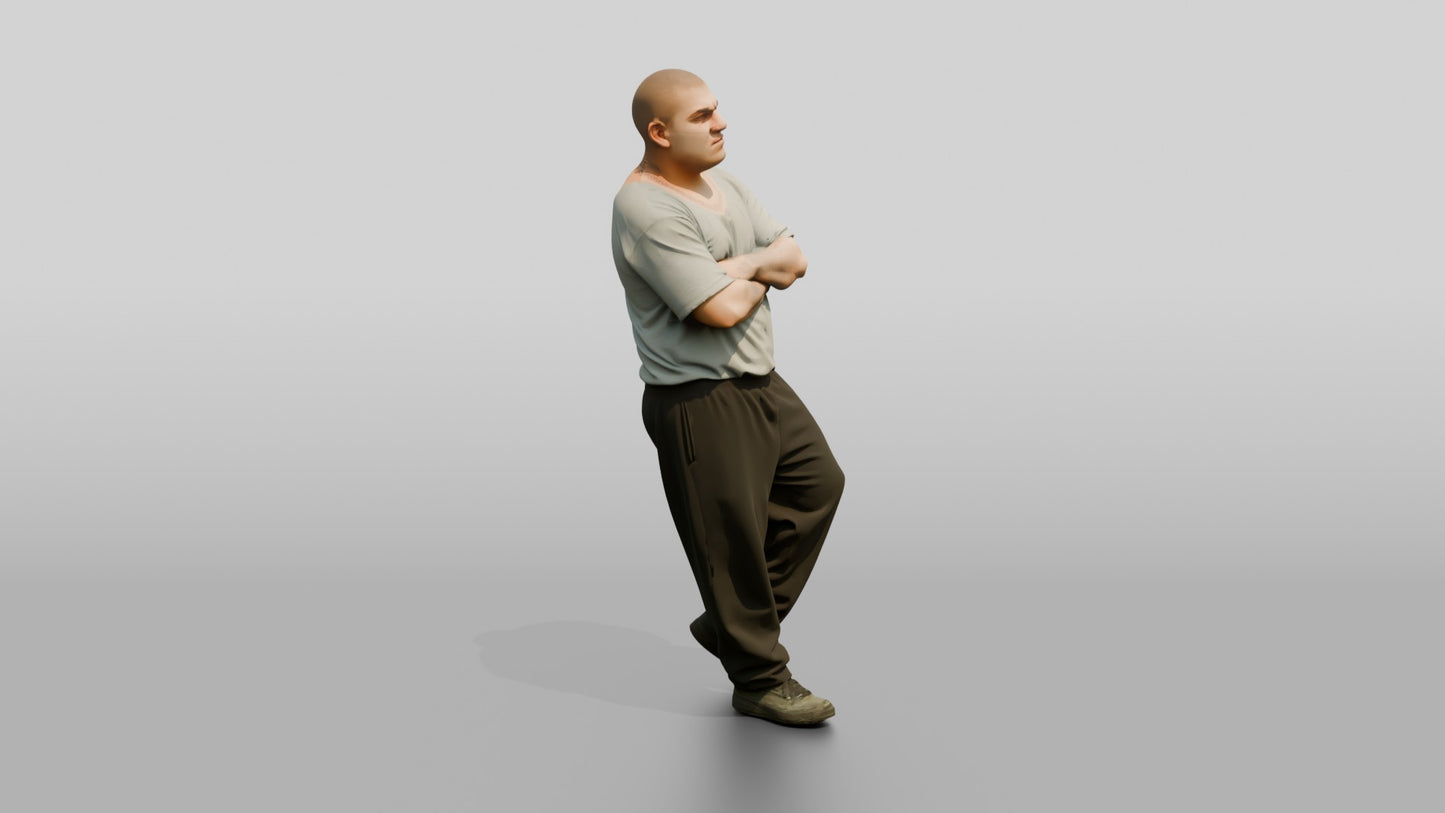 Latino Male Prisoner in a Grey T-shirt and Black Sweatpants