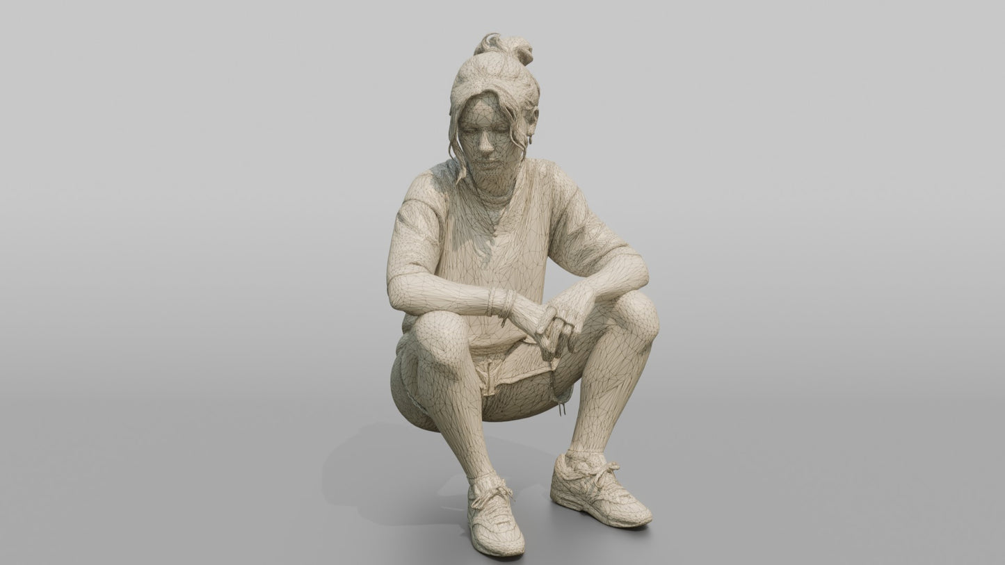 Teenager Sitting on a Curb in Streetwear