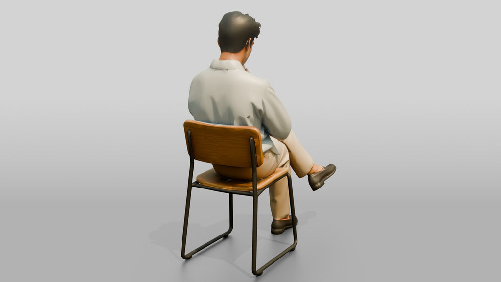 Businessman Sitting in Light Blue Shirt