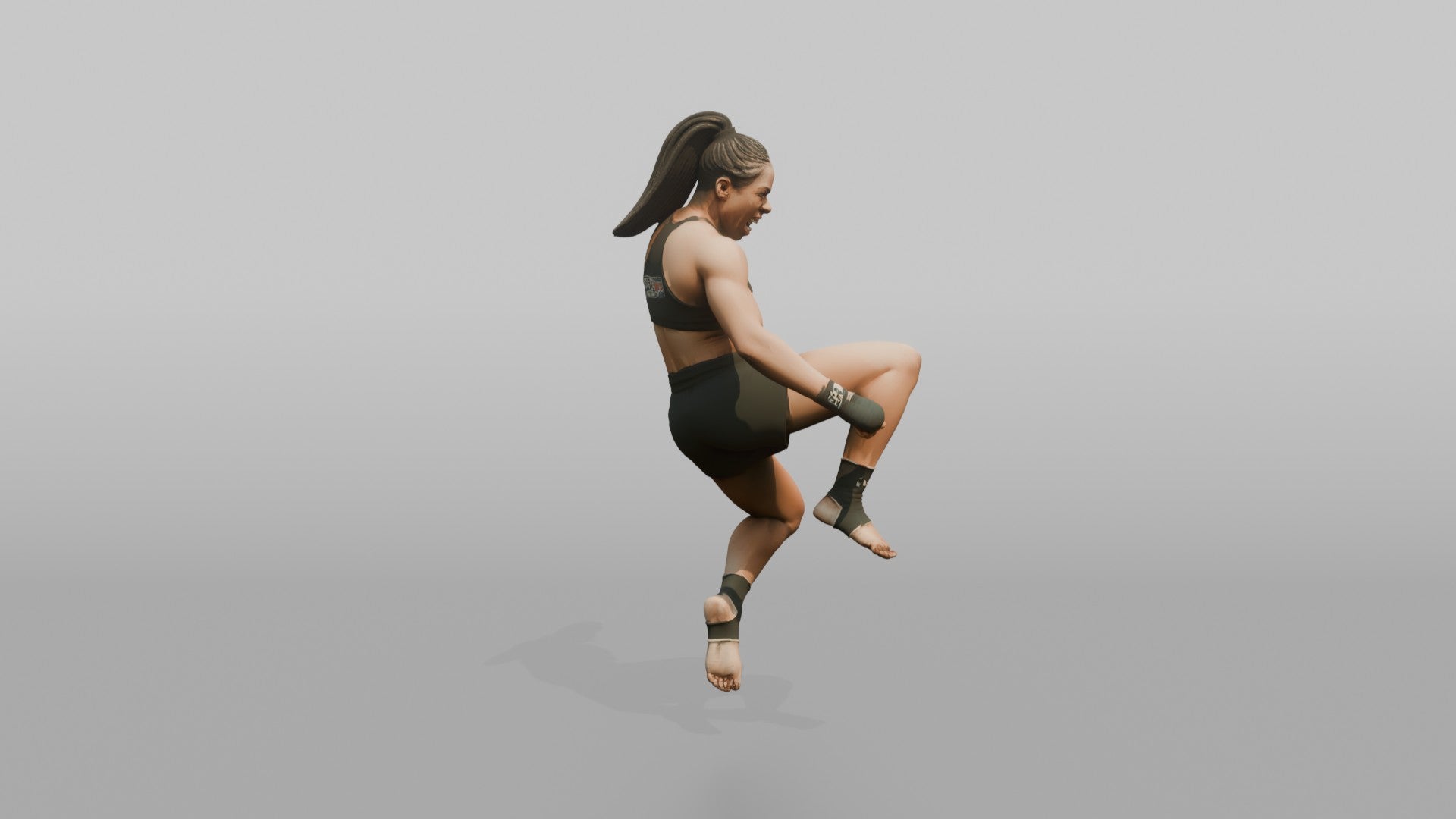 Fighter Jumping Knee Toward the Camera