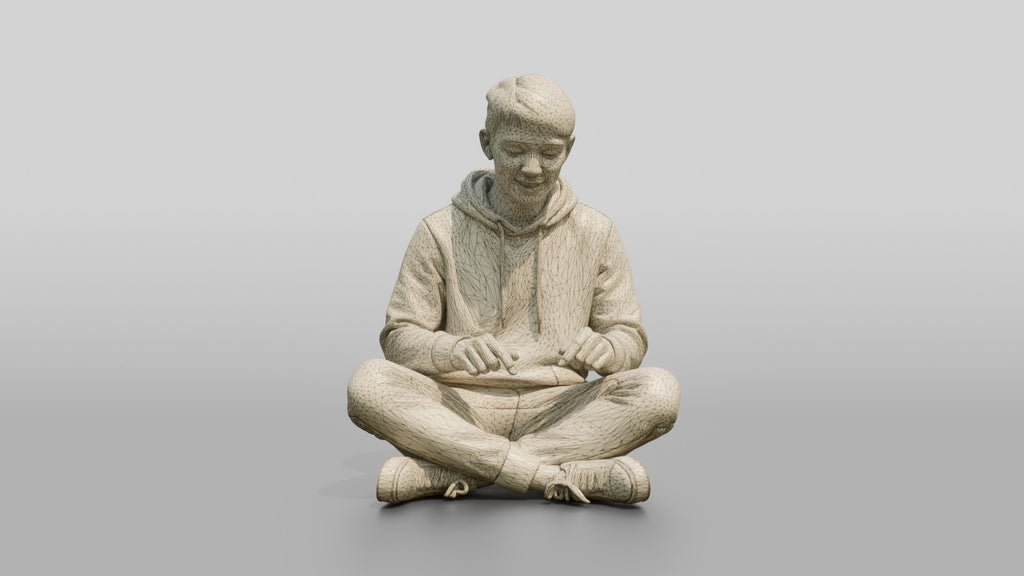 Young Chinese Man Sitting Cross-Legged Relaxing