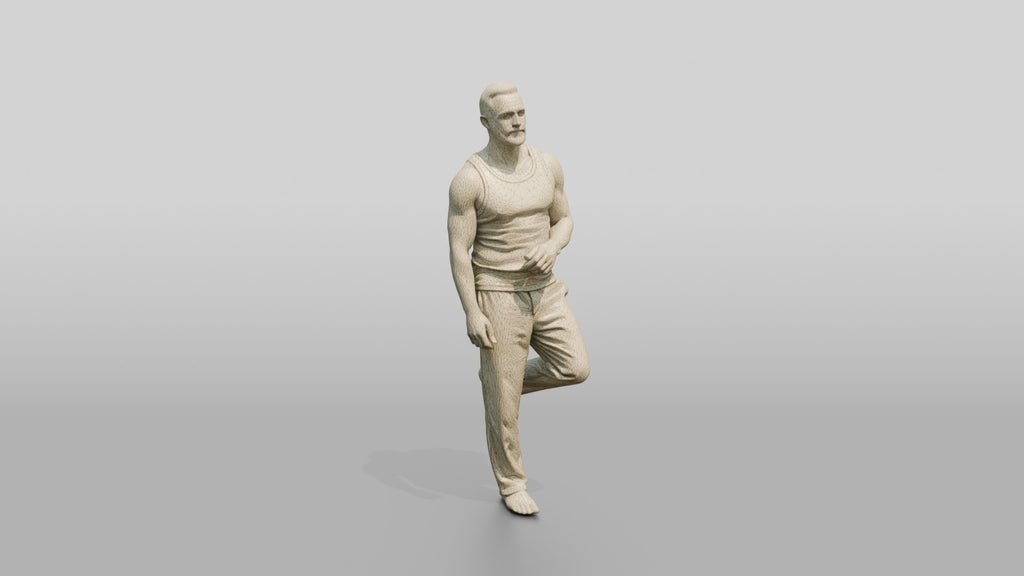 Tattooed Man Standing Casually