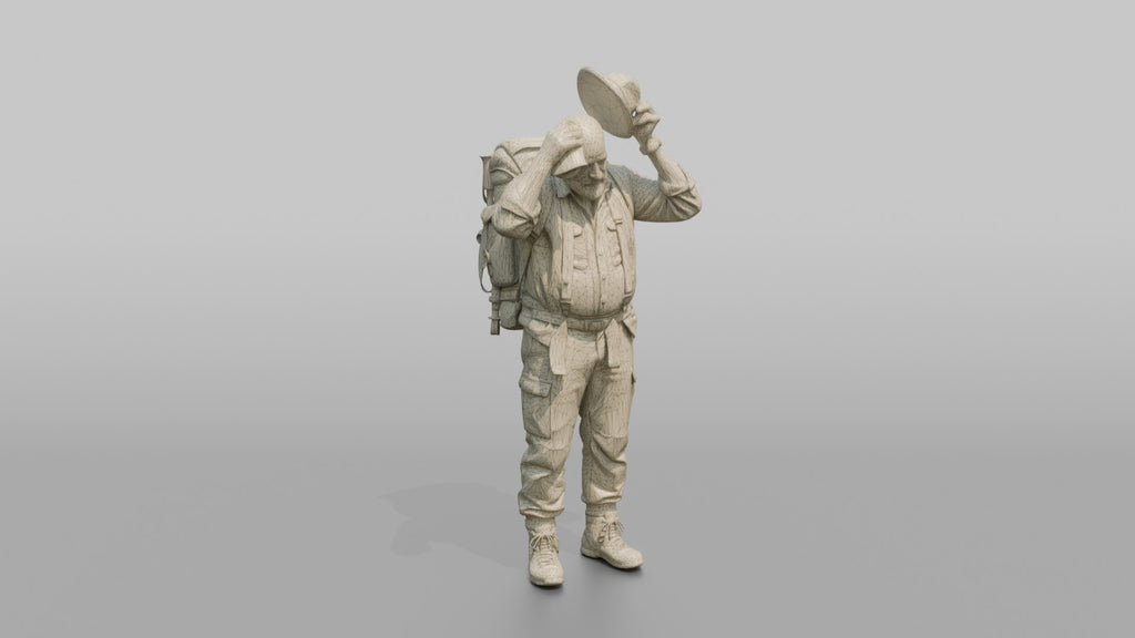 Hiker Wiping His Head with a Handkerchief