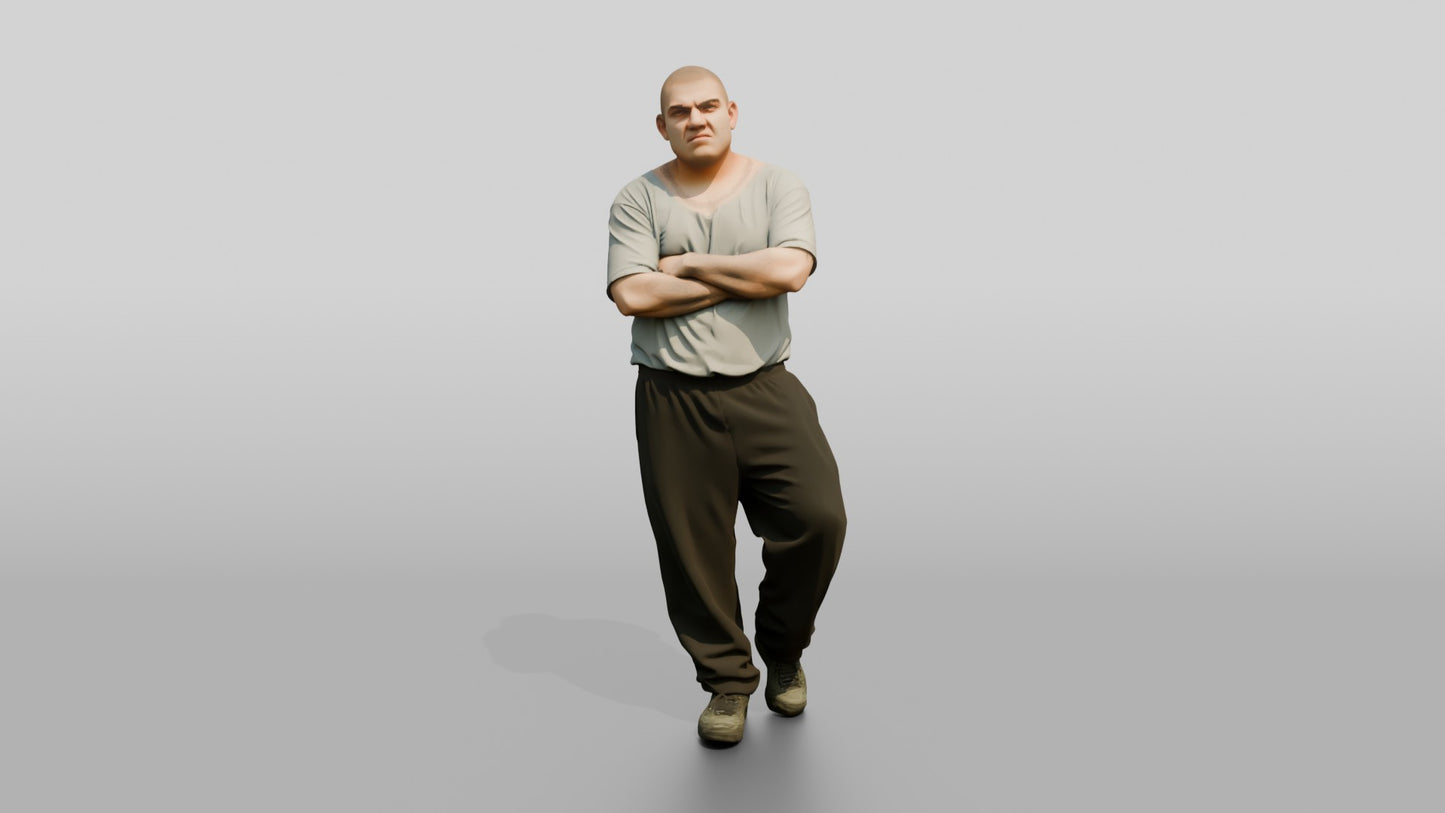 Latino Male Prisoner in a Grey T-shirt and Black Sweatpants