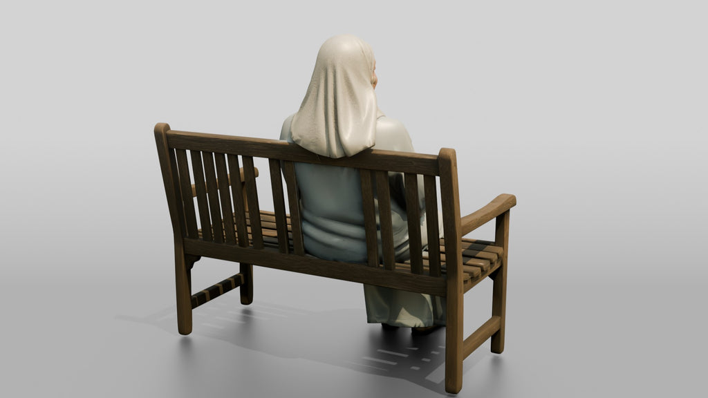 Elderly Iraqi Woman in Hijab Smiling on a Bench