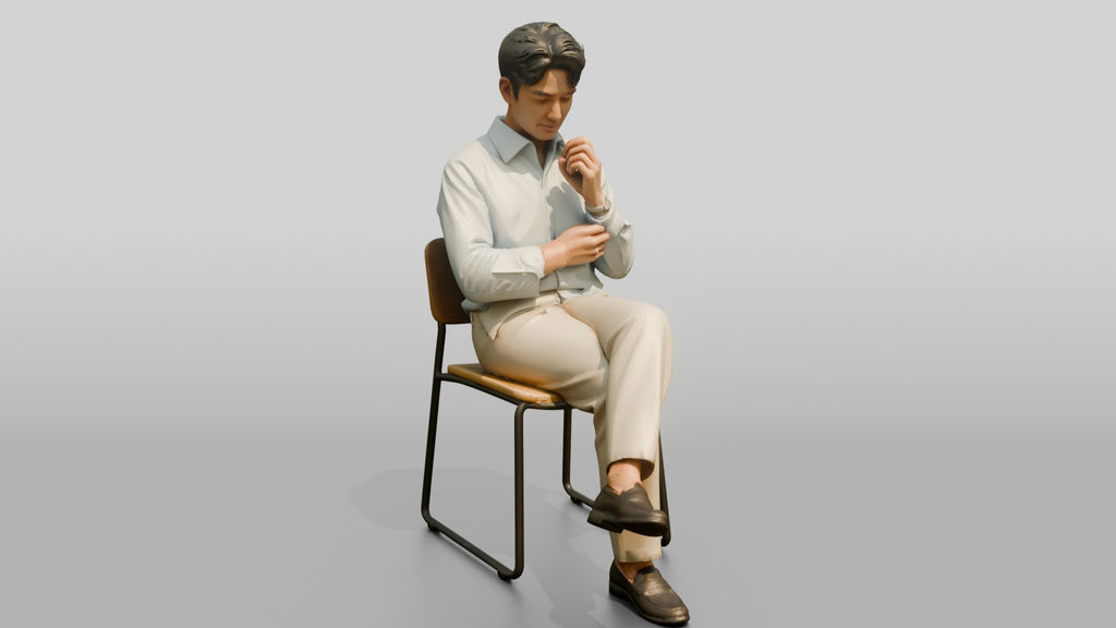 Businessman Sitting in Light Blue Shirt
