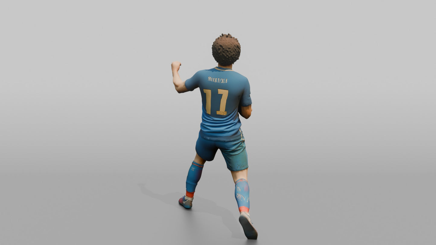 French Player Grabbing His Jersey Crest in Triumph