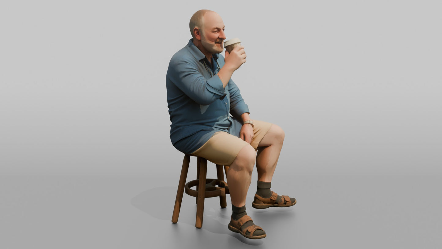 British Man Sitting with a Takeaway Coffee