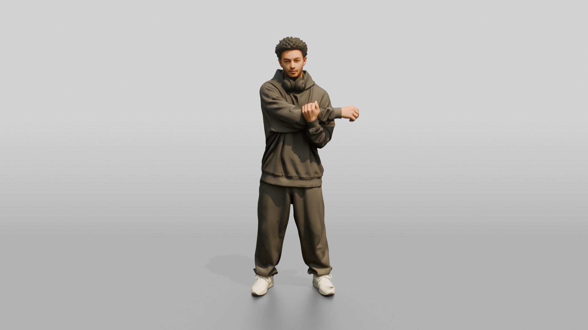 Man Stretching Arms in Oversized Hoodie