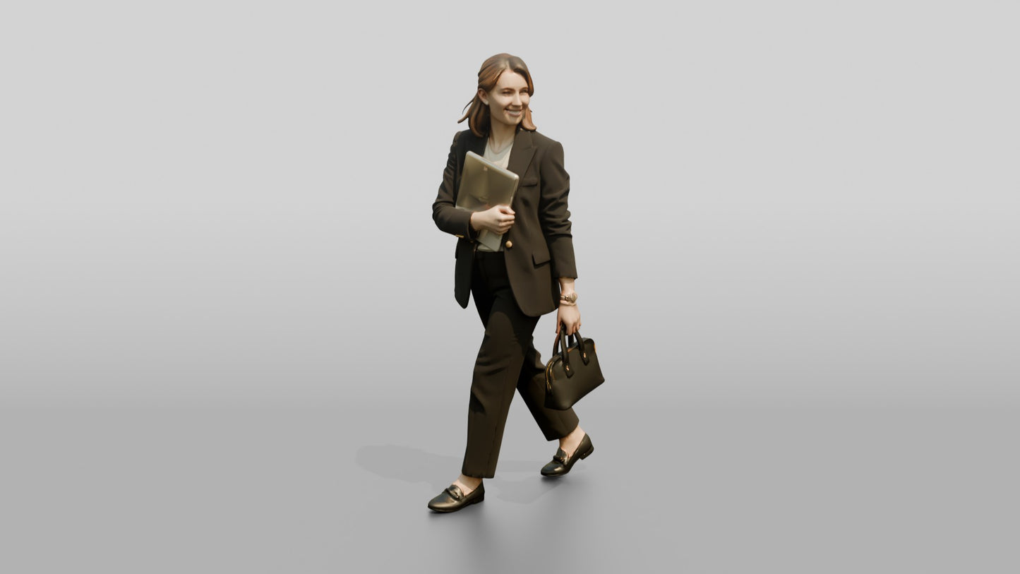 Woman Carrying a Laptop to a Meeting