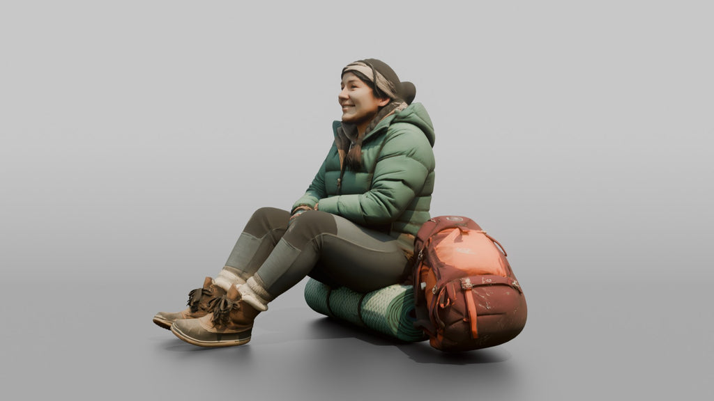 Hiker Sitting on a Rolled Foam Sleep Pad