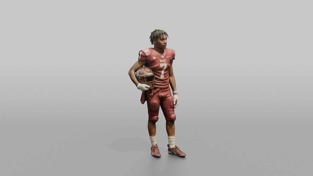 Quarterback Standing with Helmet Under His Arm