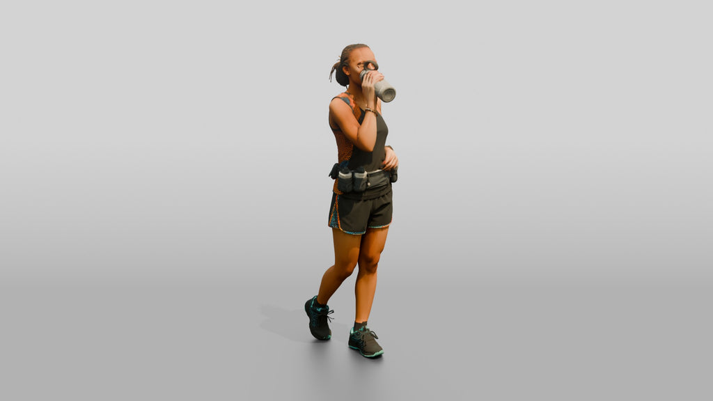African Woman Runner Drinking Water